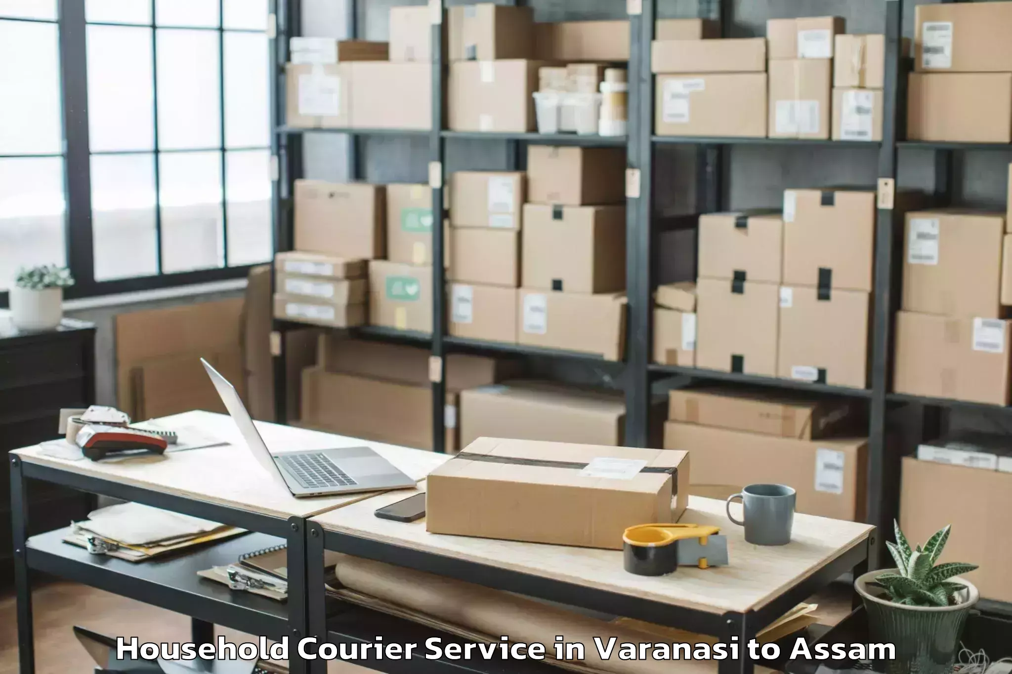 Top Varanasi to Rajapara Khatajuli Household Courier Available